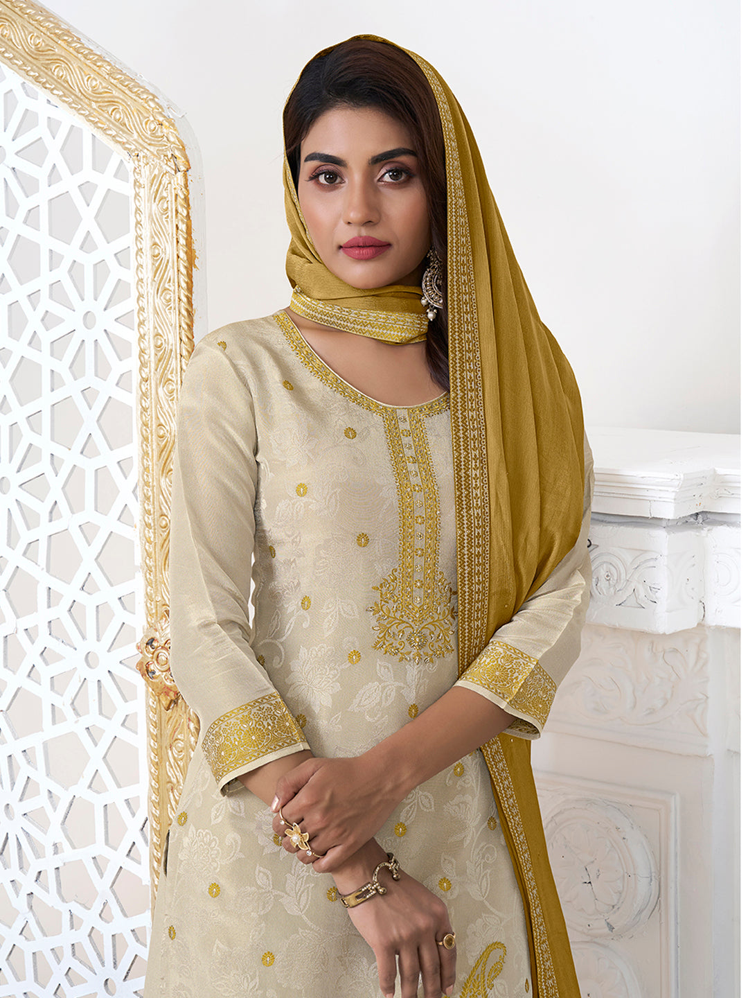 Cream Tissue Embossed Jacquard Kurta Suit Set with Yellow Contrast Dupatta.
