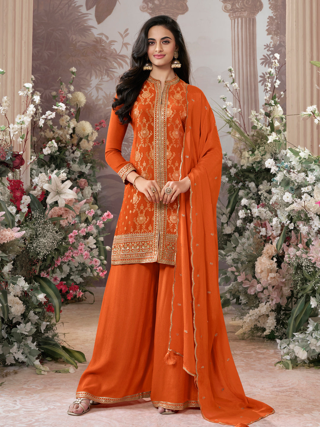 Orange Chinon Kurta Set with Heavy Jacquard Work Paired with Chinon Dupatta with Embroidered Work.