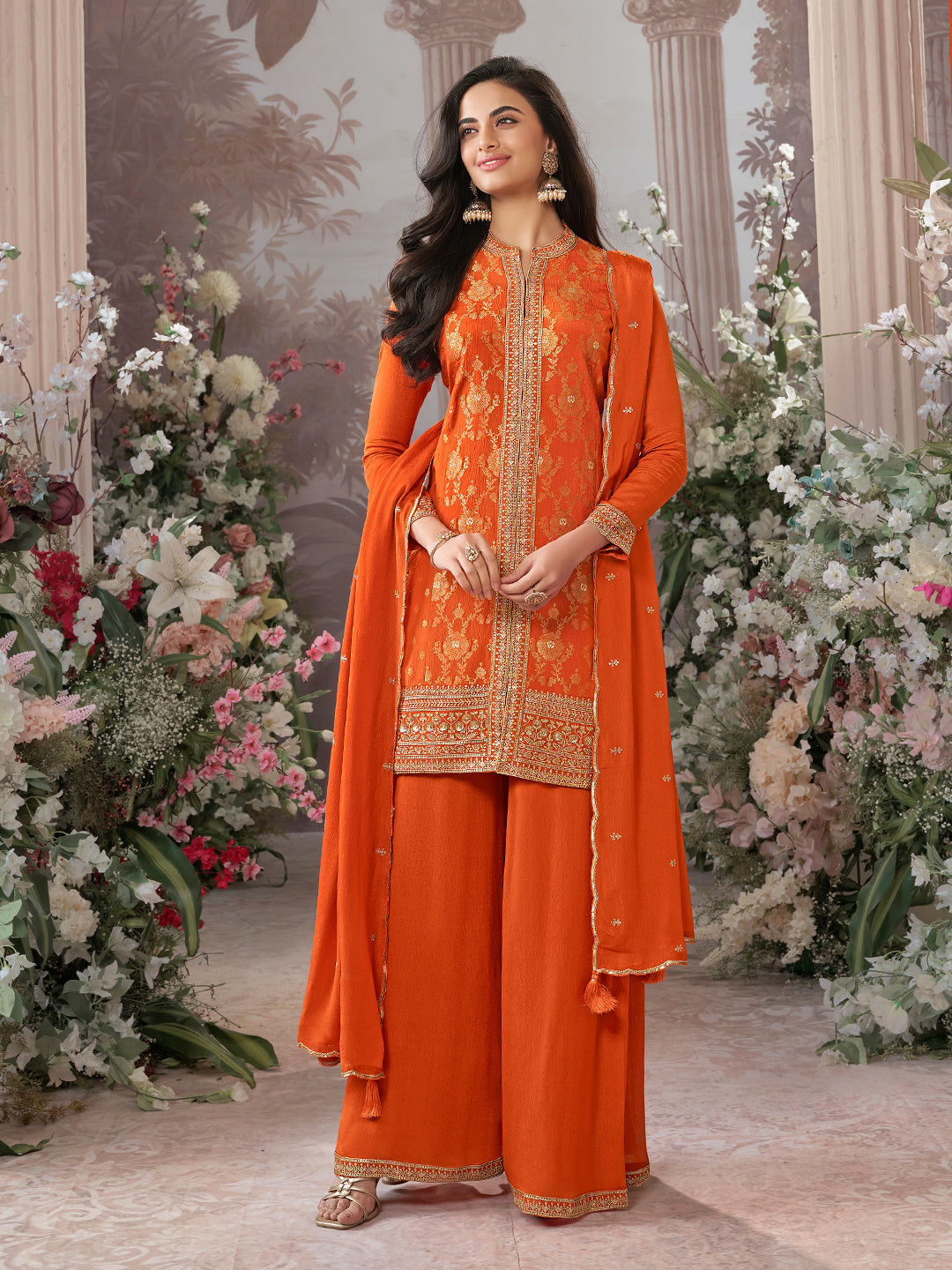Orange Chinon Kurta Set with Heavy Jacquard Work Paired with Chinon Dupatta with Embroidered Work.