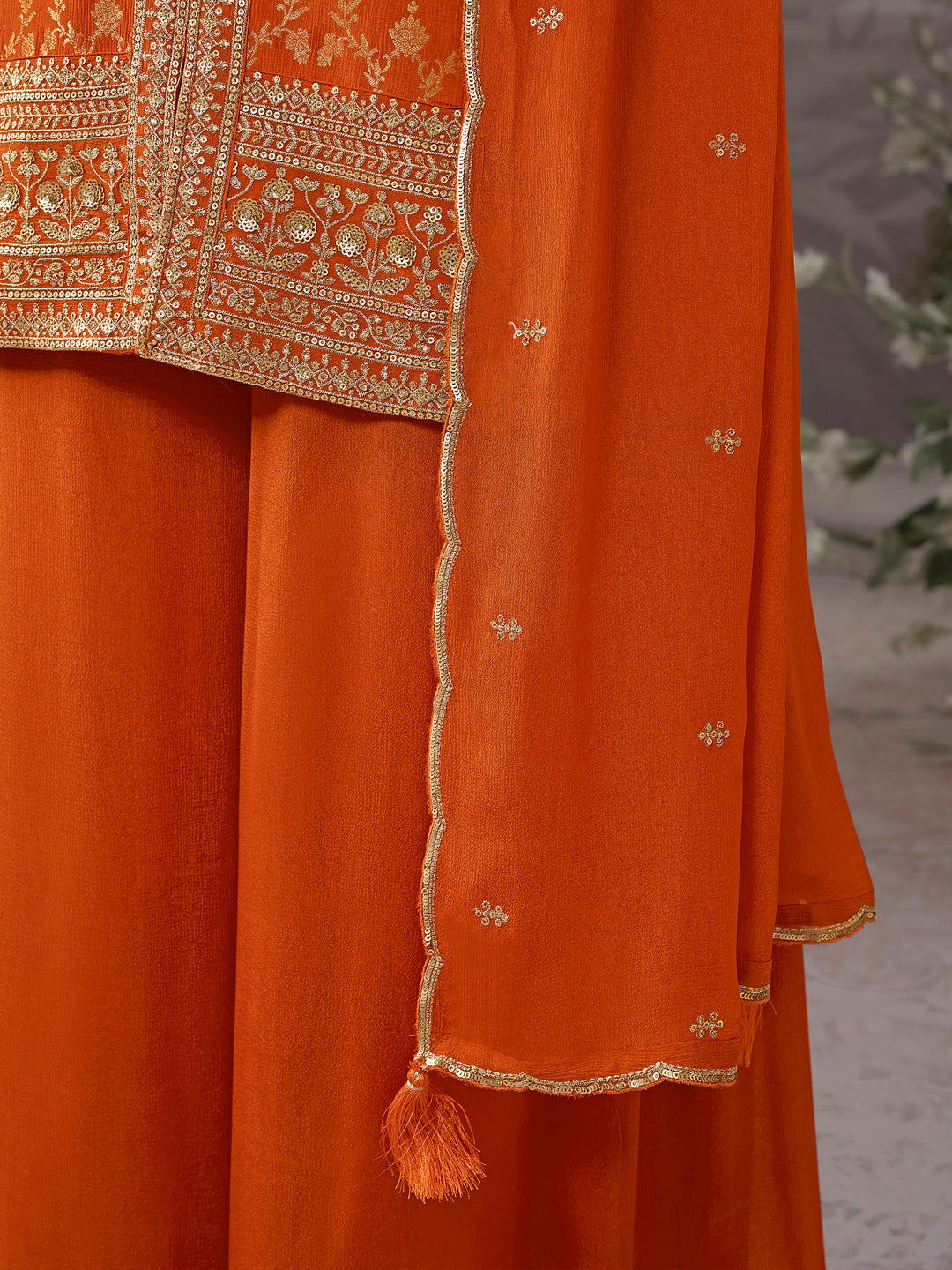 Orange Chinon Kurta Set with Heavy Jacquard Work Paired with Chinon Dupatta with Embroidered Work.
