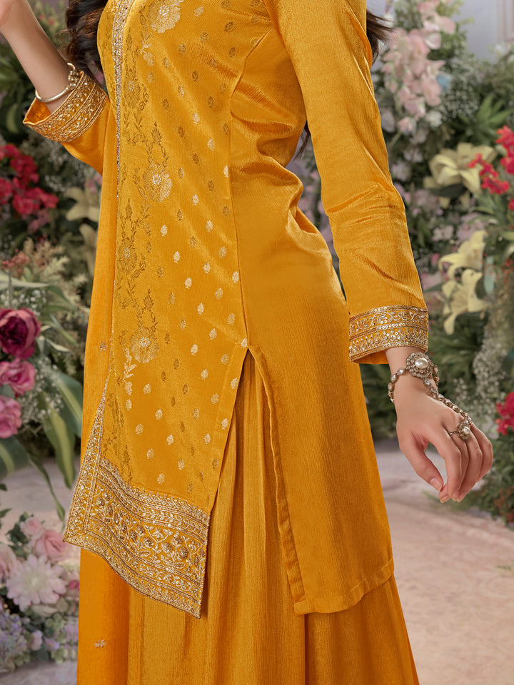 Mustard Chinon Kurta Set with Heavy Jacquard Work Paired with Chinon Dupatta with Embroidered Work.