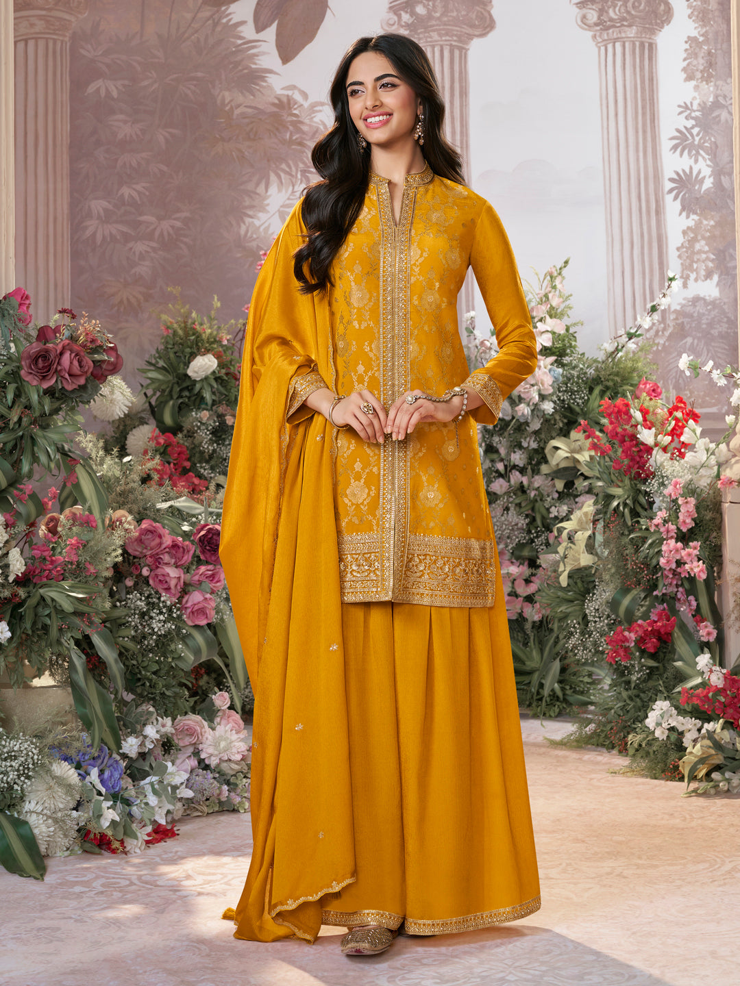 Mustard Chinon Kurta Set with Heavy Jacquard Work Paired with Chinon Dupatta with Embroidered Work.