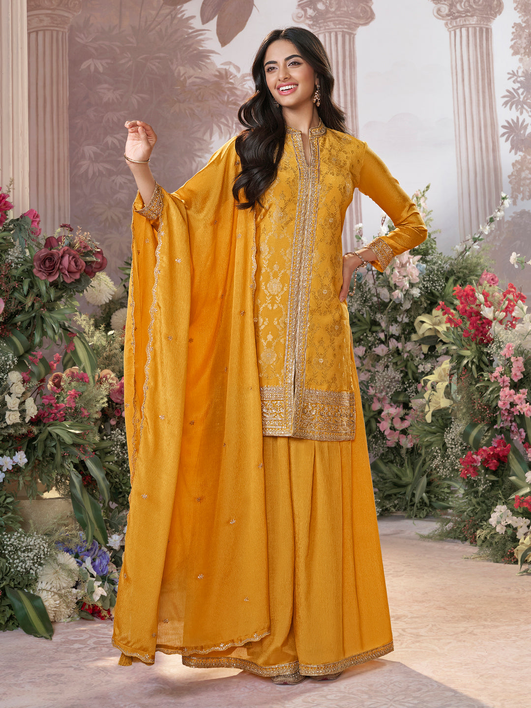 Mustard Chinon Kurta Set with Heavy Jacquard Work Paired with Chinon Dupatta with Embroidered Work.