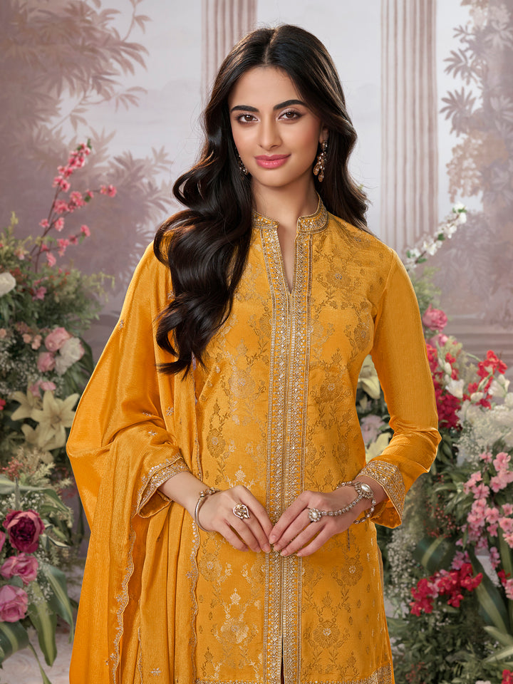 Mustard Chinon Kurta Set with Heavy Jacquard Work Paired with Chinon Dupatta with Embroidered Work.