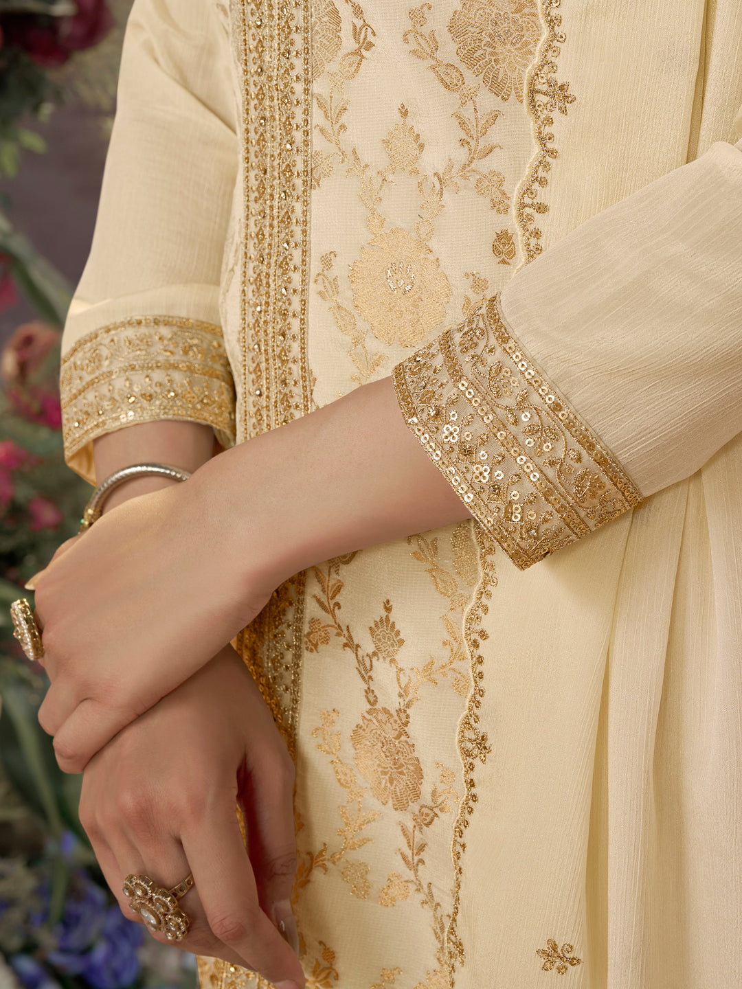 Off White Chinon Kurta Set with Heavy Jacquard Work Paired with Chinon Dupatta with Embroidered Work.