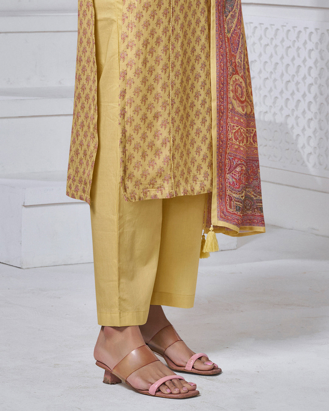 YELLOW PRINTED WITH LACE WORK STRAIGHT KURTA WITH DYED TROUSERS AND PRINTED DUPATTA