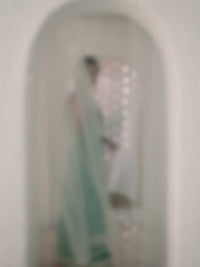 Floral and Geometric Threadwork Embrace Green Kurta Set with Hanging Pearl Daman, Straight Pant, and Dupatta