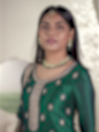 Bottle Green Designer Top Adorned with Exquisite Embroidered Palazzo Suit Set